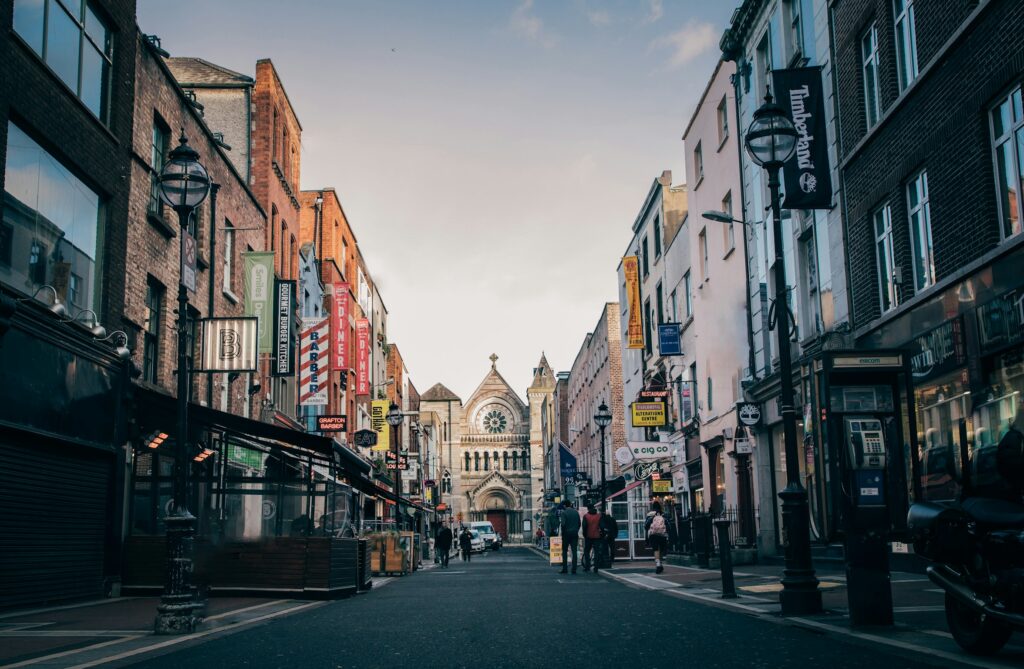 Ha'penny Bridge and colorful buildings in Dublin, one of the best places to visit in Ireland.