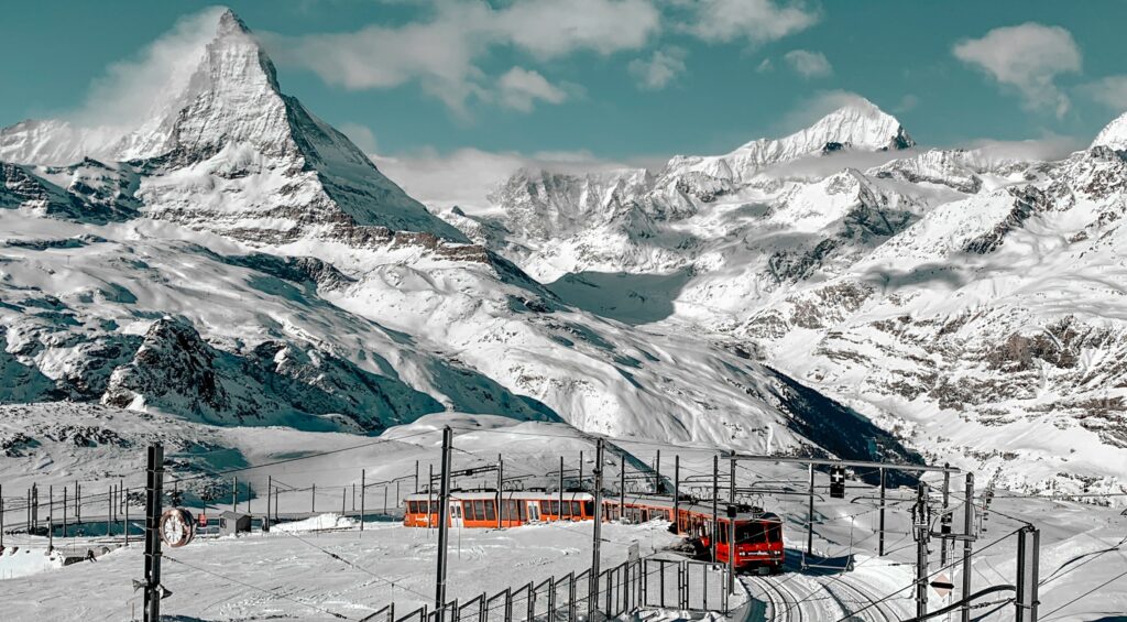 Snow-covered Swiss Alps mountains with a winter landscape in Switzerland during December travel